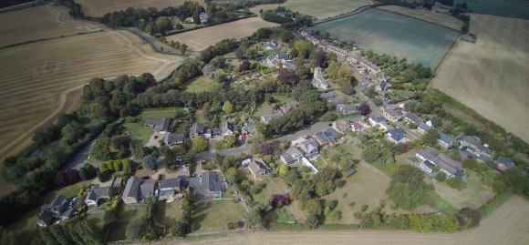 Aerial view of Quinton with School Lane in the foreground