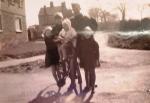 Looking up School Lane -

Mr Piercy in Home Guard Uniform

and his children Syd, Fran, Ann and Connie