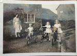 Outside September Cottage

(barn, washhouse and toilet to right,

then Bakehouse with window)

L R Mrs Piercy, Syd, Connie and Fran