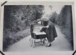 Geraldine Rooks in pram with

Doreen Raine School Lane

towards Sept Cottage c1956