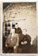 Mr and Mrs Jeffs, (Front)

and sister Piercy Evans outside back window

at back of Bakehouse (in churchyard - 3 small headstones

just past the terracotta grave)