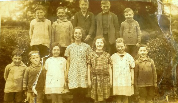 Early 1930s School Pupils

top row, 2nd from right: John Tyson
bottom row, 1st left: Ken Frost
- and some of the girls in the front row came from West Hall